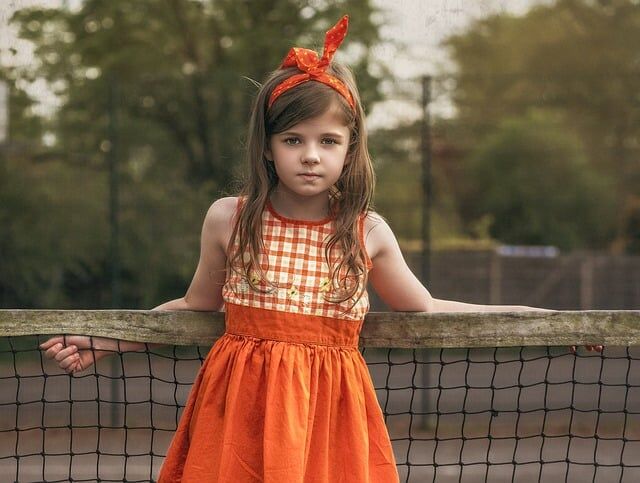 Elegance in Citrus: The Surprising Style of the Orange Evening Dress